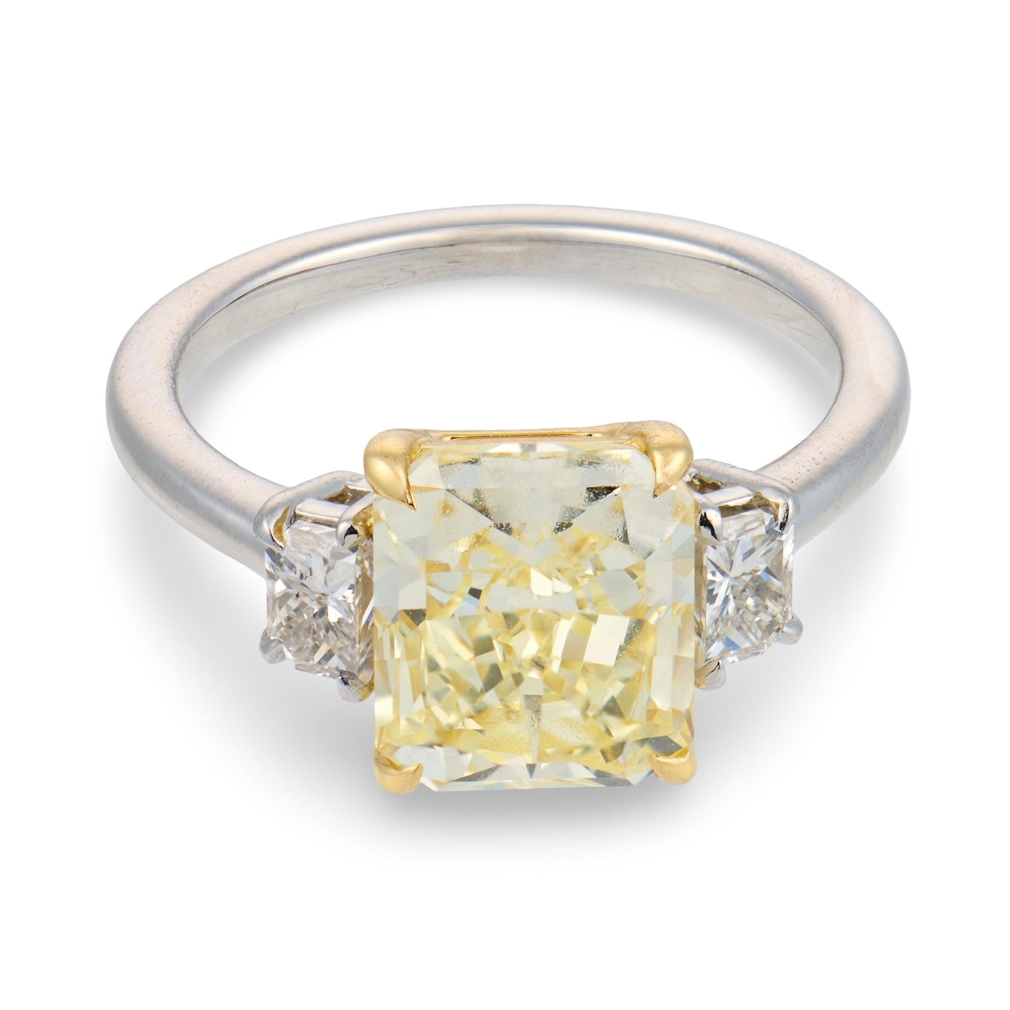 GIA 3.50 carat fancy yellow VVS1 diamond platinum engagement ring