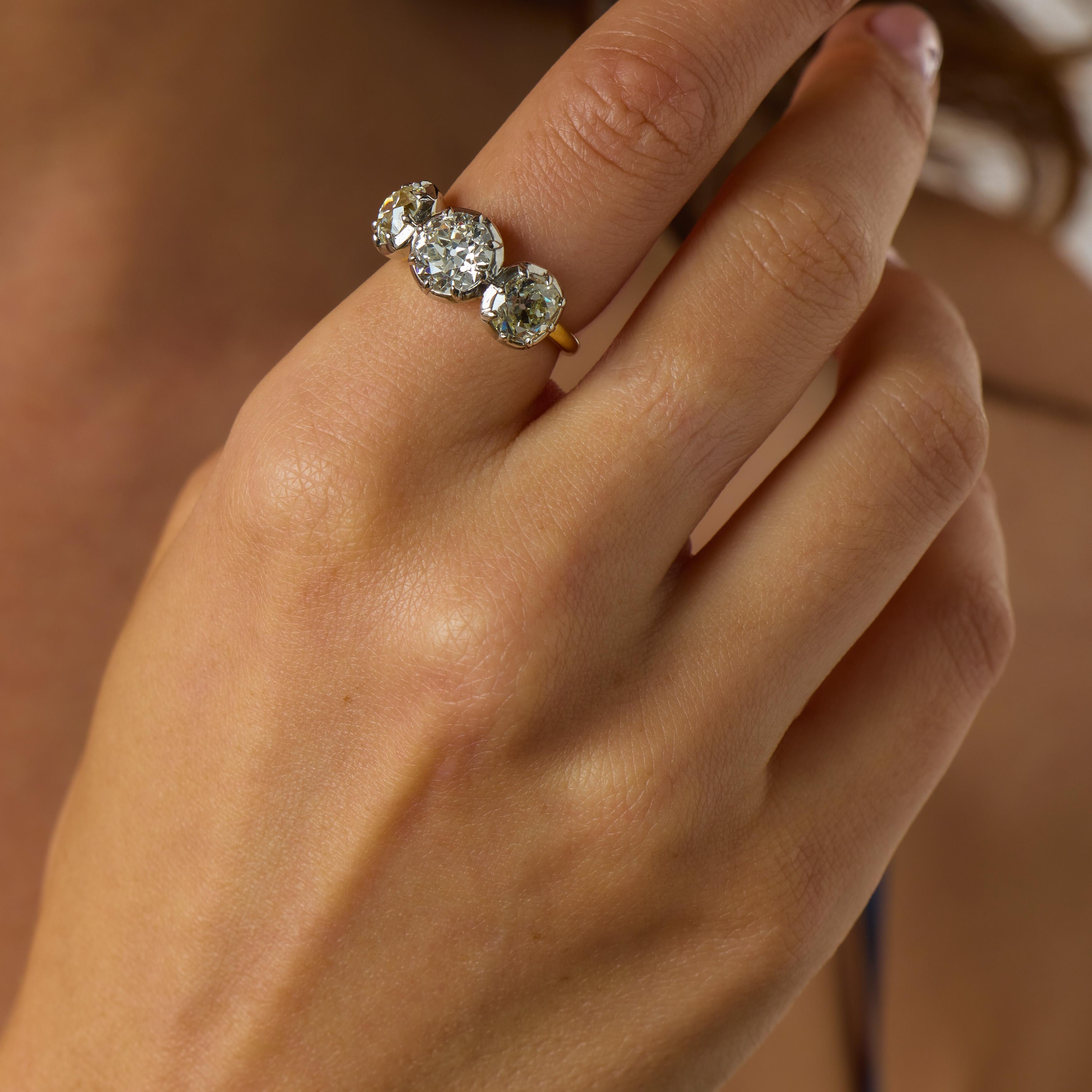 GIA 4.58 carat old cut diamond 18k yellow gold colette set three stone ring