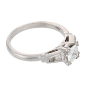 Mid Century step cut diamond platinum engagement ring