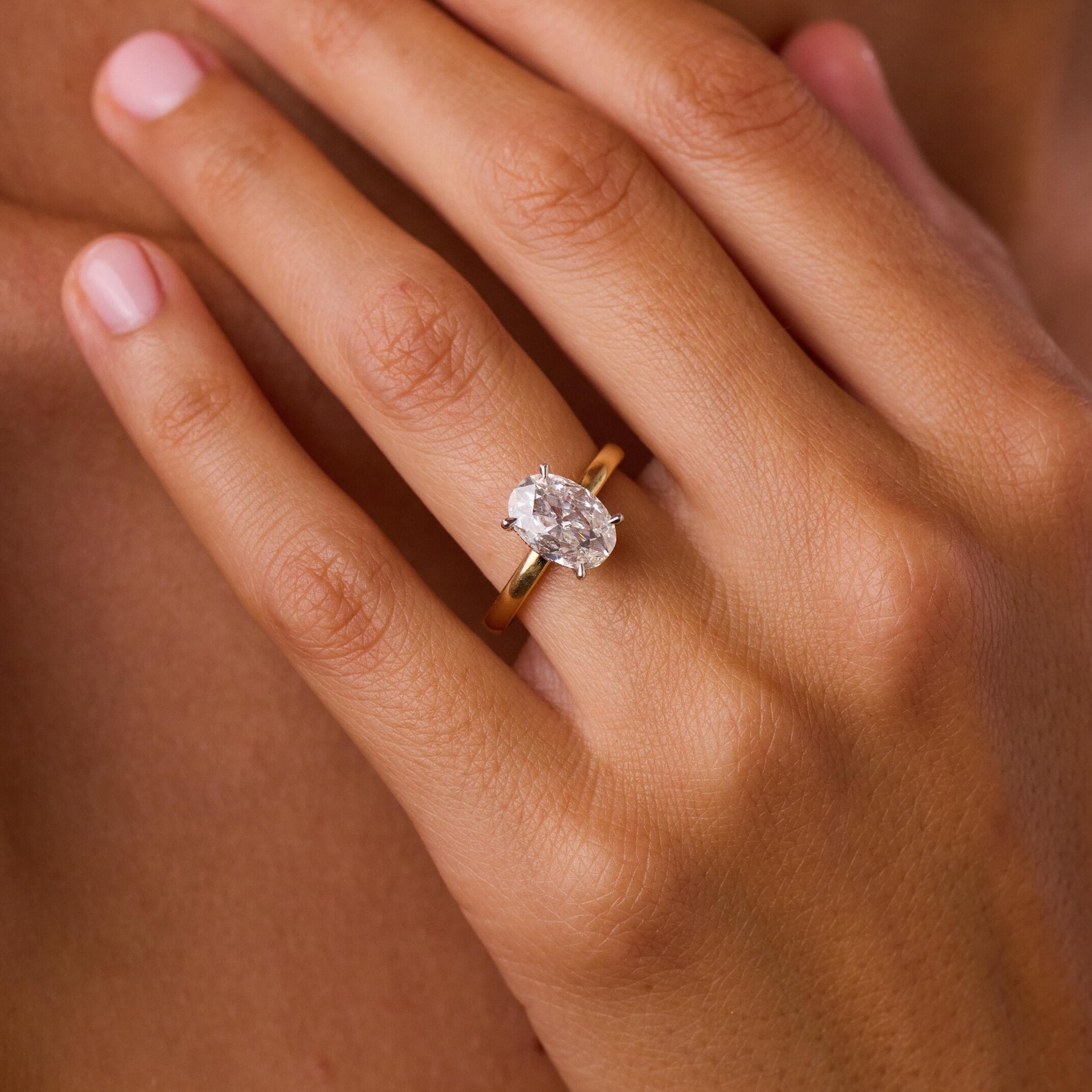 Tulum GIA 1.56 carat oval cut diamond 18k yellow gold platinum engagement ring