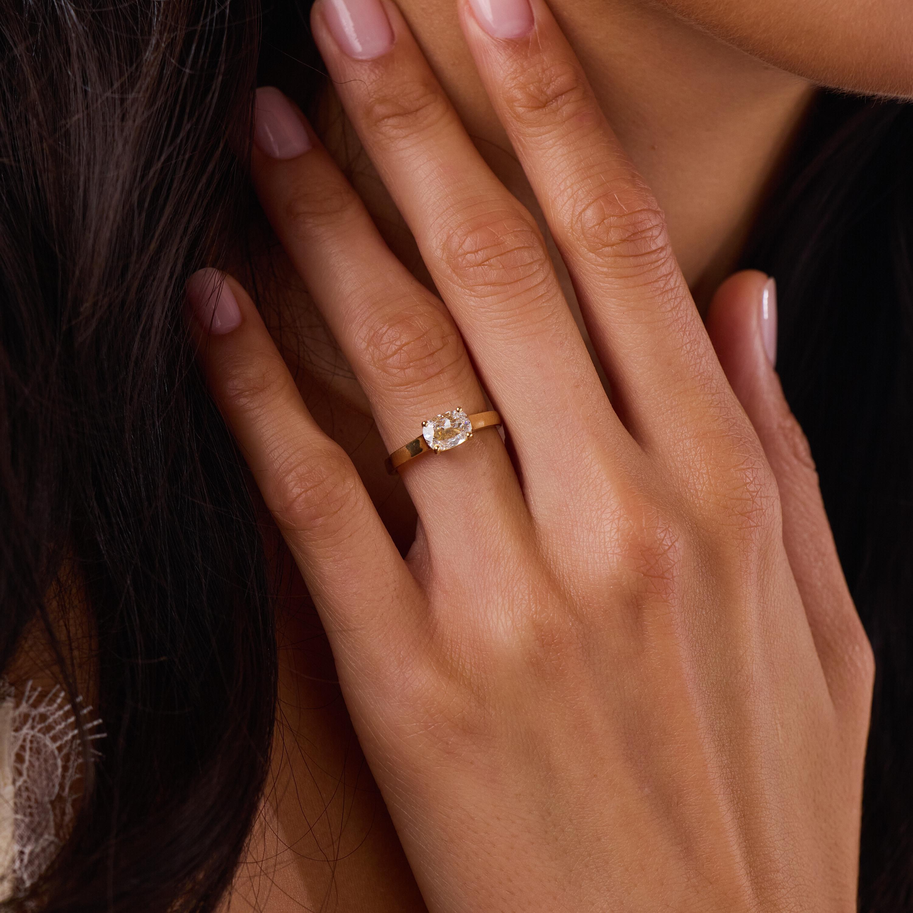 East West prong GIA 0.90 carat cushion cut diamond 18k gold engagement ring