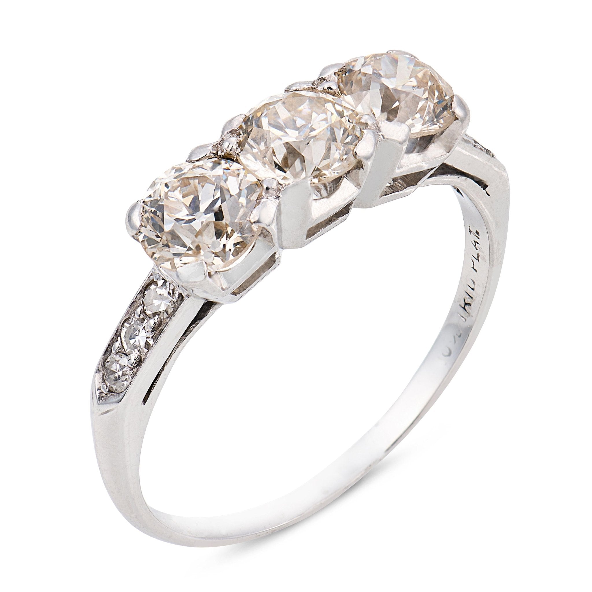Art Deco old European cut diamond platinum three stone engagement ring