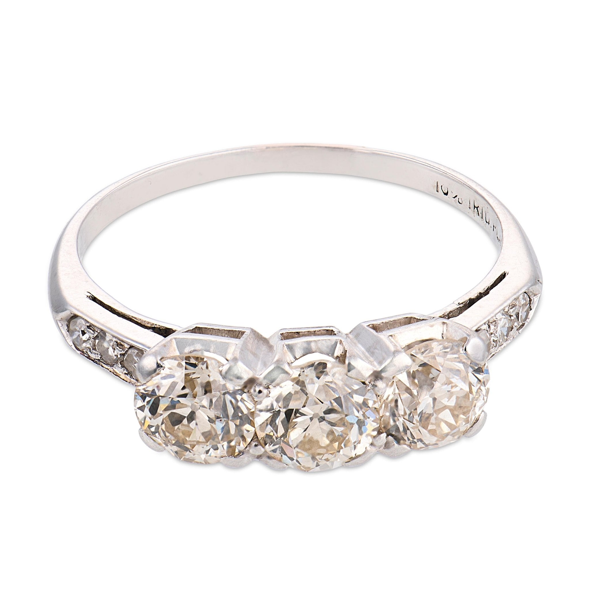 Art Deco old European cut diamond platinum three stone engagement ring