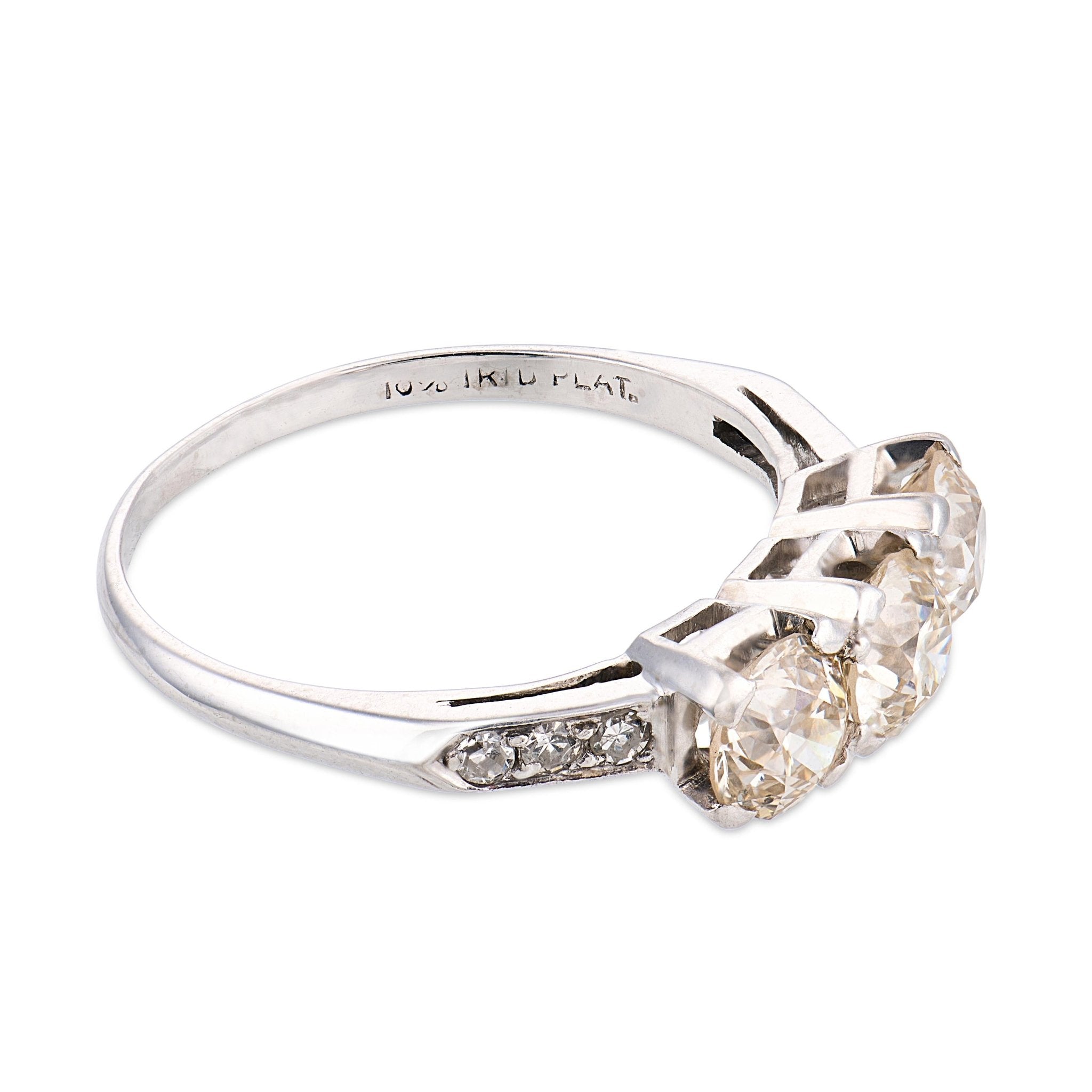 Art Deco old European cut diamond platinum three stone engagement ring