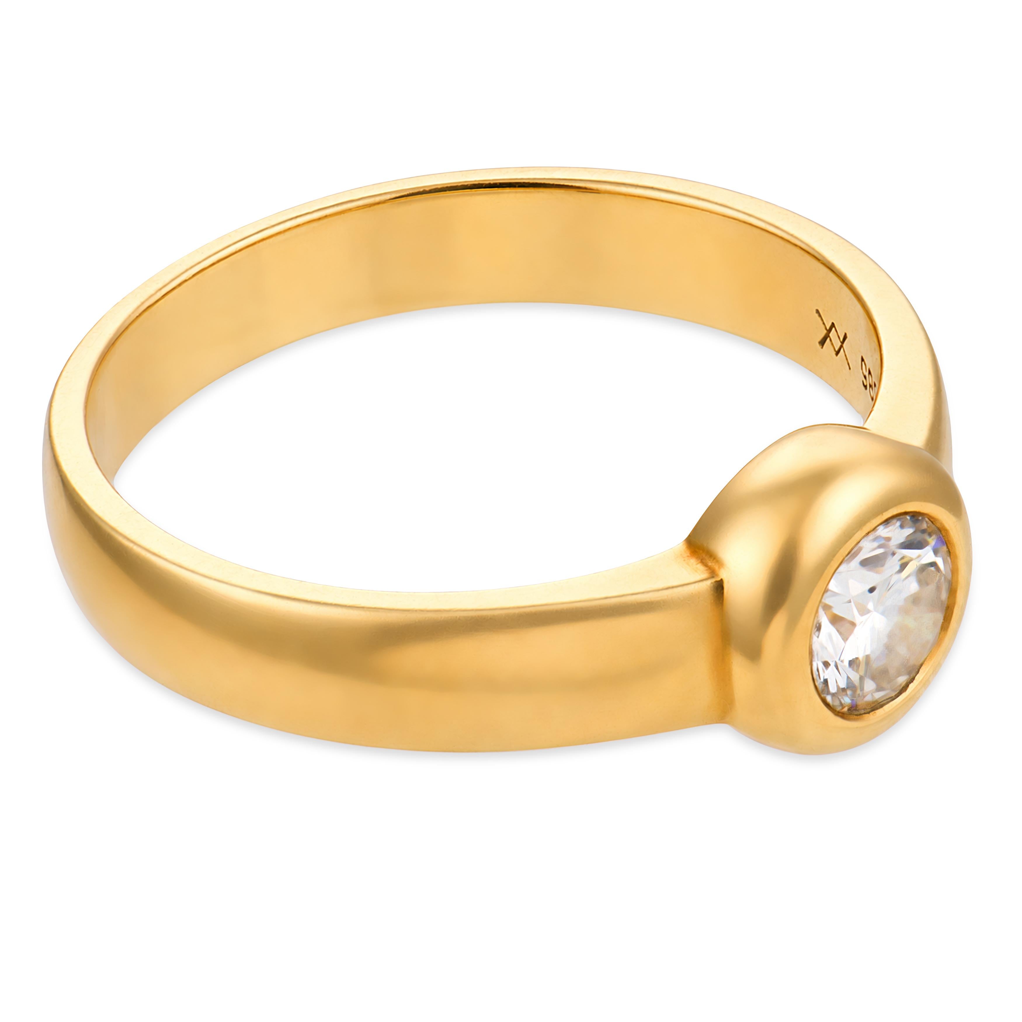 Vintage round brilliant cut diamond 14k yellow gold bezel set ring