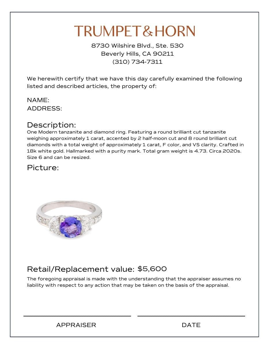 Modern tanzanite diamond 18k white gold ring