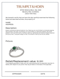 Modern emerald diamond platinum ring