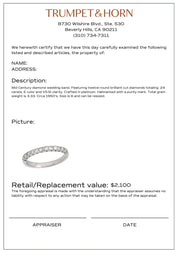 Mid Century diamond platinum wedding band