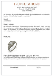Art Deco diamond platinum bezel engagement ring