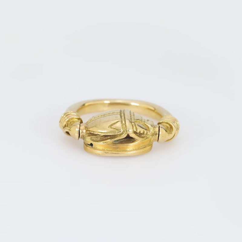 Mid Century 18k yellow gold swivel scarab ring