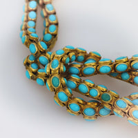 Antique French 11.80 carat total weight turquoise 18k yellow gold knot bracelet