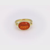 Modern 3.90 carat fire opal 18k yellow gold east-west bezel ring
