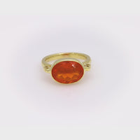 Modern 3.90 carat fire opal 18k yellow gold east-west bezel ring