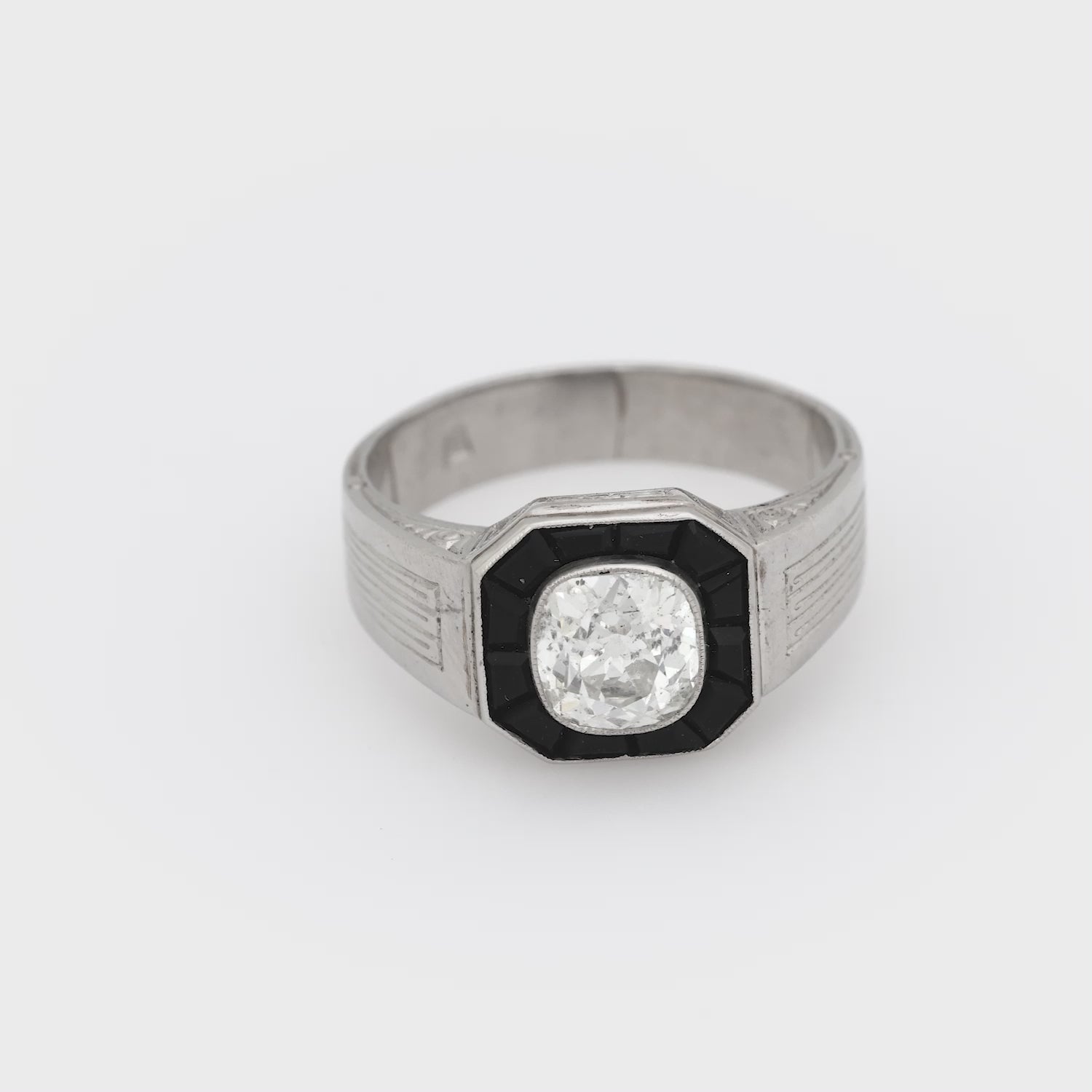 Art Deco style 1.25 carat old mine cut diamond onyx platinum engagement ring