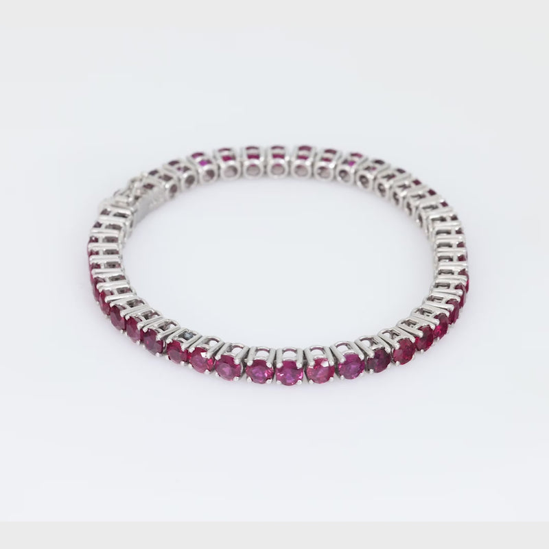 Puig Doria 15 carat total weight ruby 18k white gold tennis bracelet