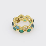 Modern gemstone and diamond 18k yellow gold eternity band set