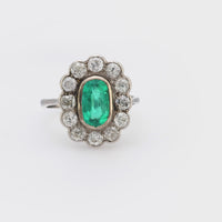 GIA 1.60 carat oval cut emerald diamond platinum cluster ring