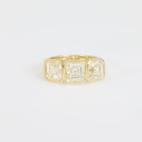 GIA 6.02 carat total weight Asscher cut diamond 18k yellow gold three stone ring