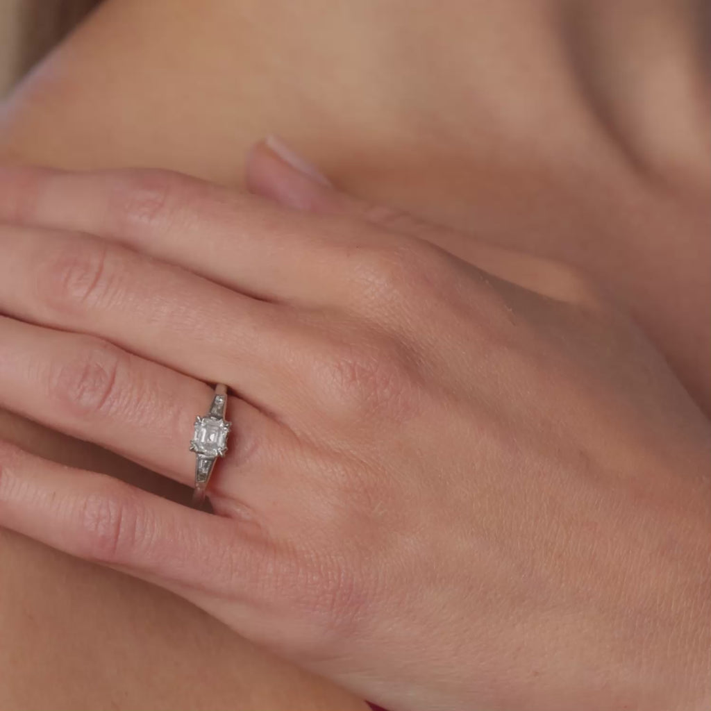 Mid Century step cut diamond platinum engagement ring