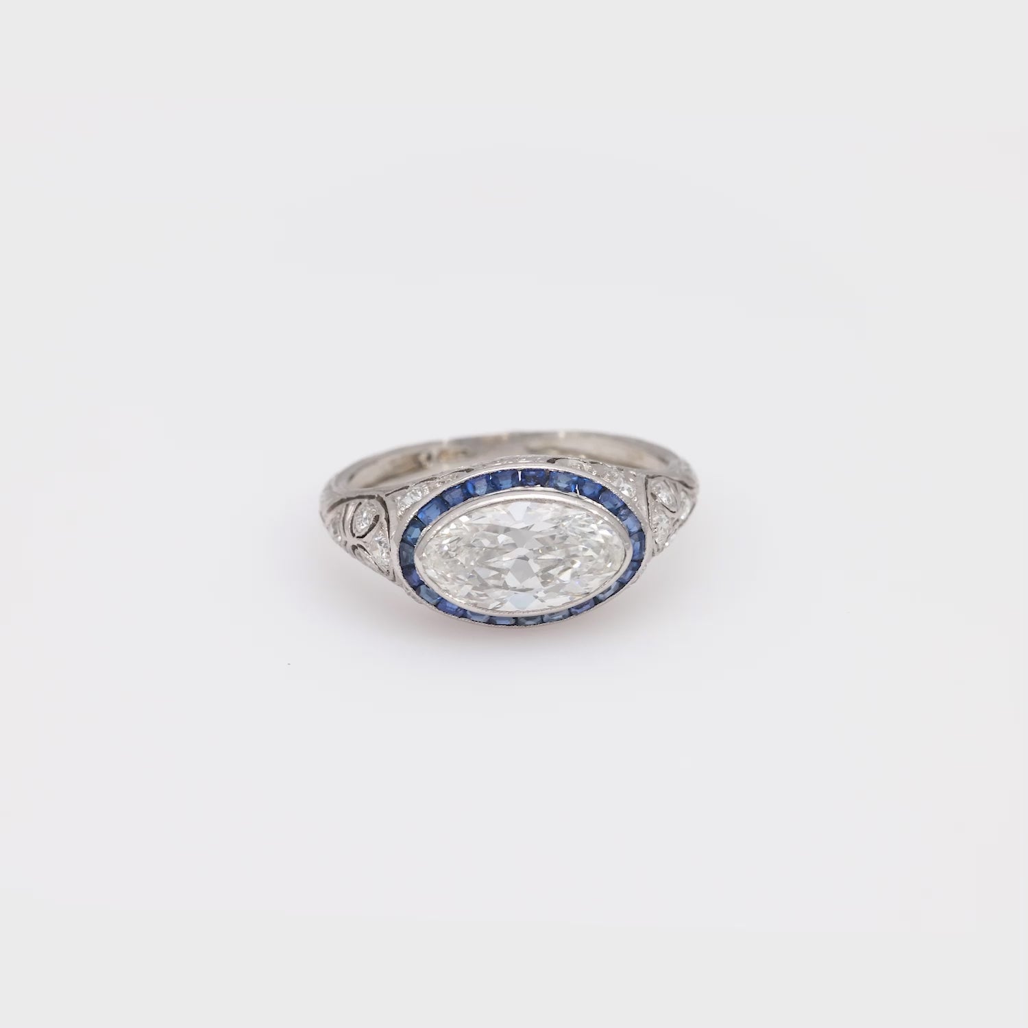 Art Deco 2 carat moval cut diamond sapphire platinum engagement ring