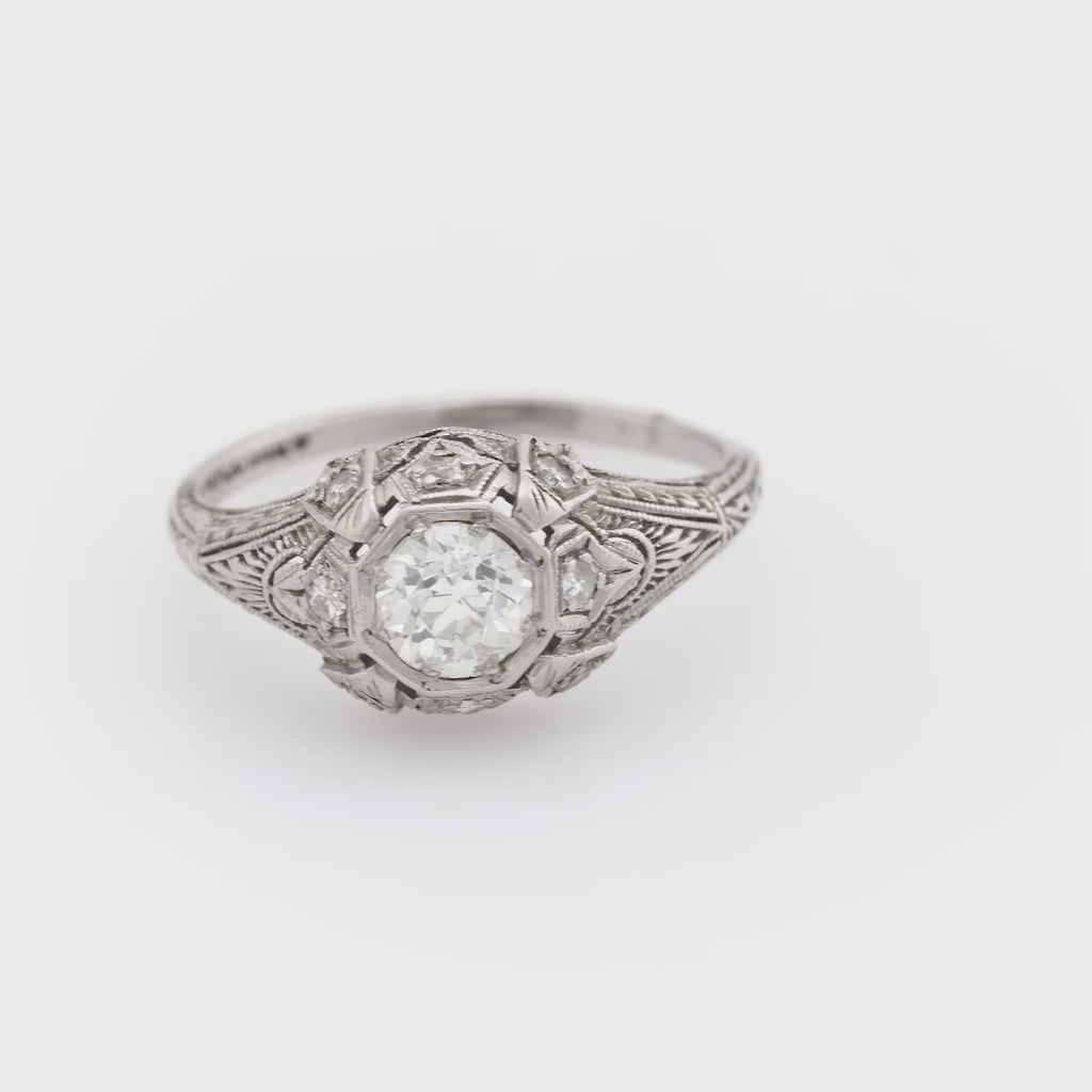 Art Deco diamond platinum bezel engagement ring