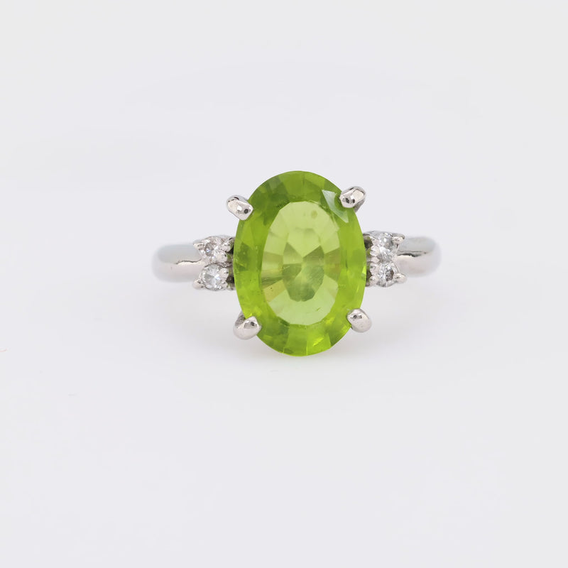 Vintage 3.40 carat peridot diamond platinum cocktail ring