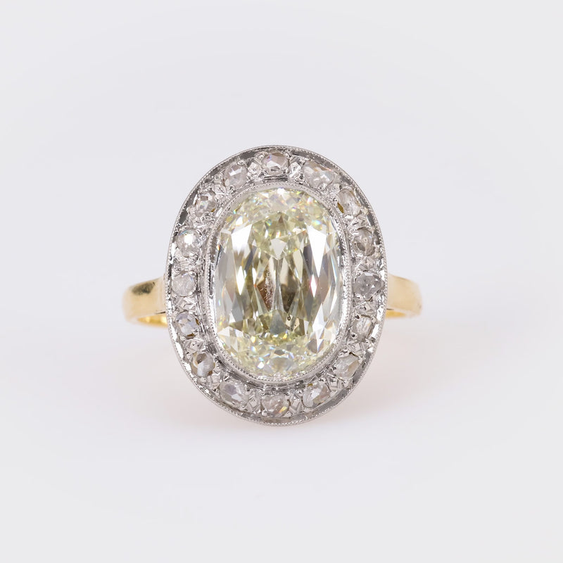 Edwardian GIA 5.02 Carat Cushion Diamond 18K Yellow Gold Cluster Ring