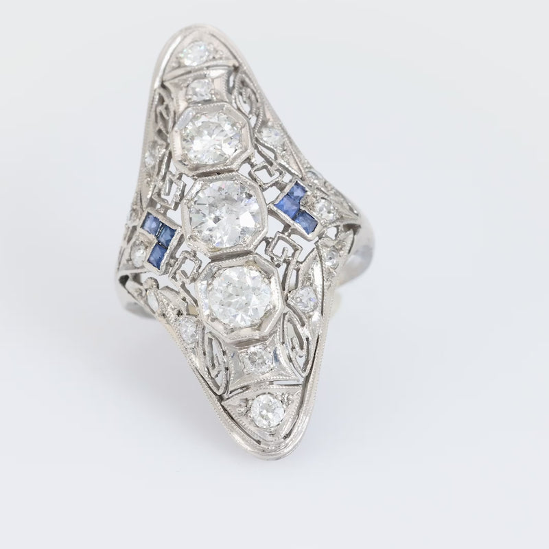 Art Deco 1.5 carat total weight diamond sapphire platinum Navette ring