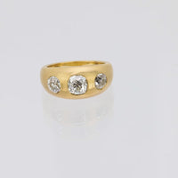 2.17 carat old mine cut diamond matte 18k gold three stone band