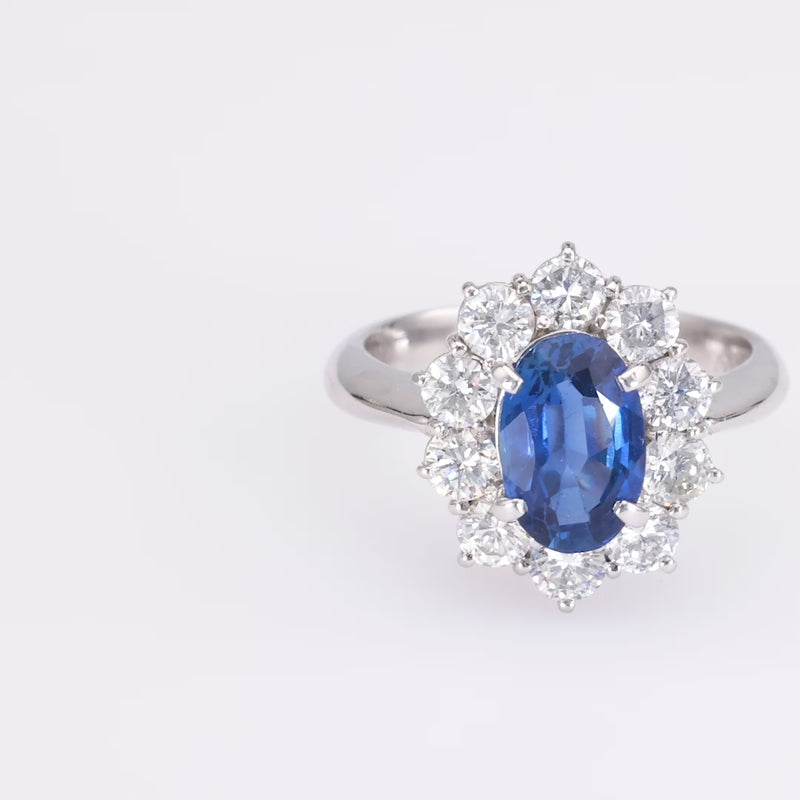 Modern Platinum Sapphire & Diamond Halo Ring