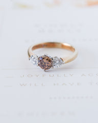 An Amazing Three Stone Fancy Colored Diamond Engagement Ring