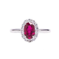 A Beautiful Modern Platinum, Ruby and Diamond Halo Engagement Ring