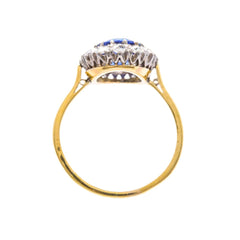 Kamari is a lovely Victorian era antique sapphire and diamond vintage engagement ring set in 18k yellow gold and platinum
