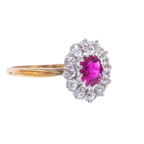 A magnificent Authentic Victorian Era Burma No Heat Ruby and Diamond Halo Ring