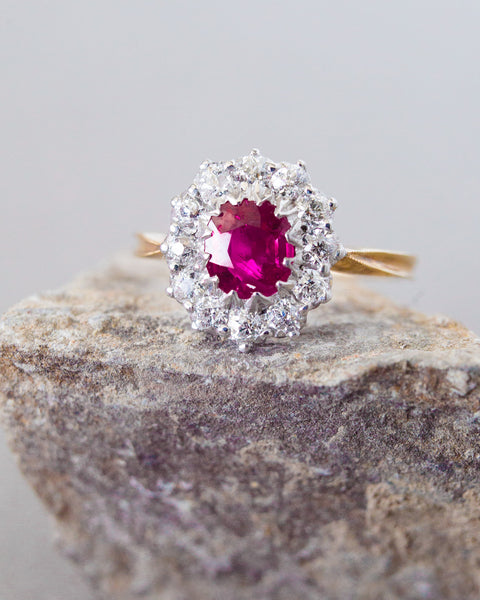 A magnificent Authentic Victorian Era Burma No Heat Ruby and Diamond Halo Ring