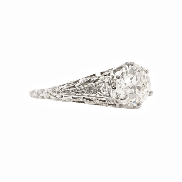 South Sussex an authentic Edwardian era platinum and diamond ring featuring a 1.17ct Old European Cut diamond