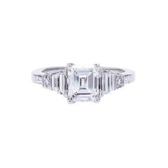 A Spectacular Modern Platinum and Emerald Cut Diamond Engagement Ring