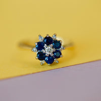 An Adorable Mid-Century Sapphire and Diamond Flower Ring