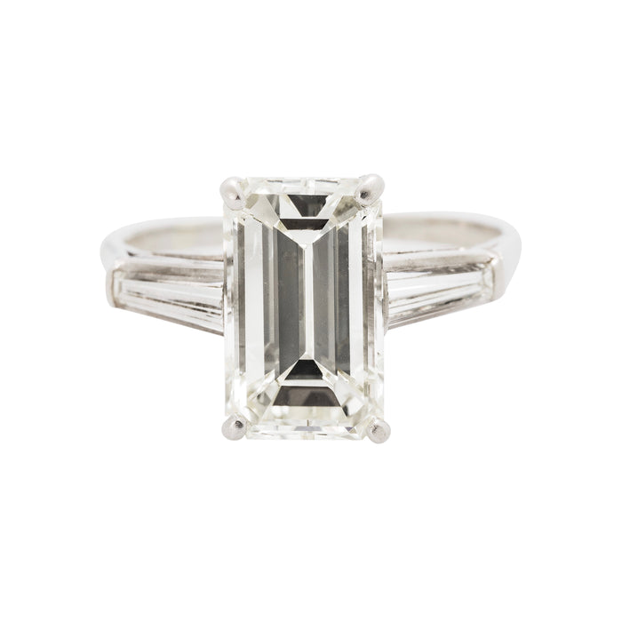 Modern Era Emerald Cut Engagement Ring