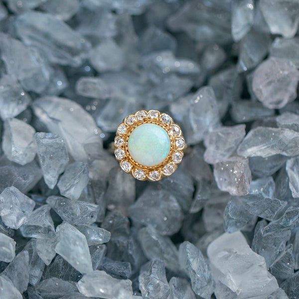 Sunny Retro Era 10mm Opal and Diamond Halo Engagement Ring | Albury