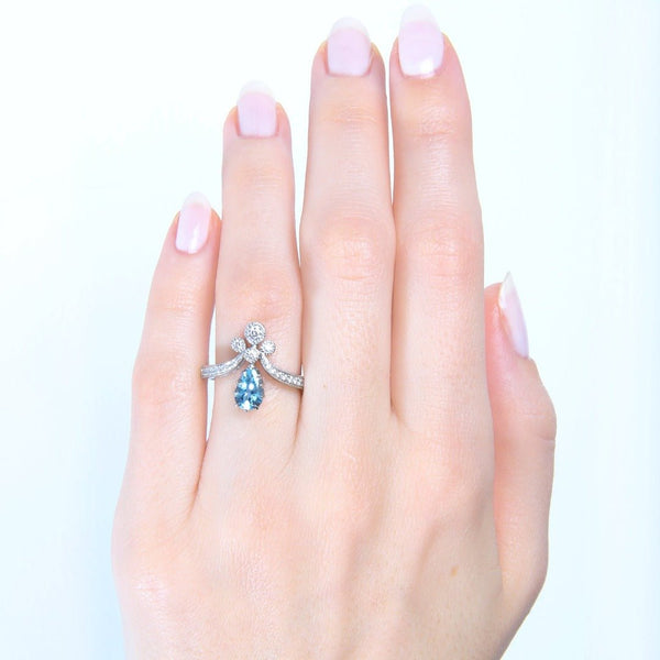 A Handcrafted Platinum, Aquamarine and Diamond Engagement Ring