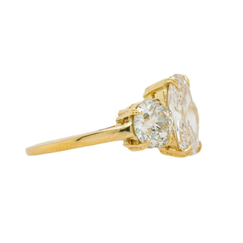 Magnificent Three-Stone Ring with Elongated Cushion Diamond | Arcadia