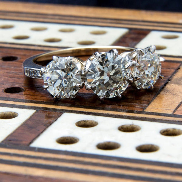 Magnolia Hill | A stunning Trumpet &Horn vintage-inspired 3-stone diamond engagement ring