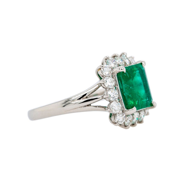 Classic Modern Emerald & Diamond Halo Platinum Ring | Belford