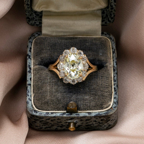 Victorian Era Antique Fancy Light Yellow Oval Diamond Halo Engagement Ring with 14k Yellow Gold Split Shank | Belle Terre