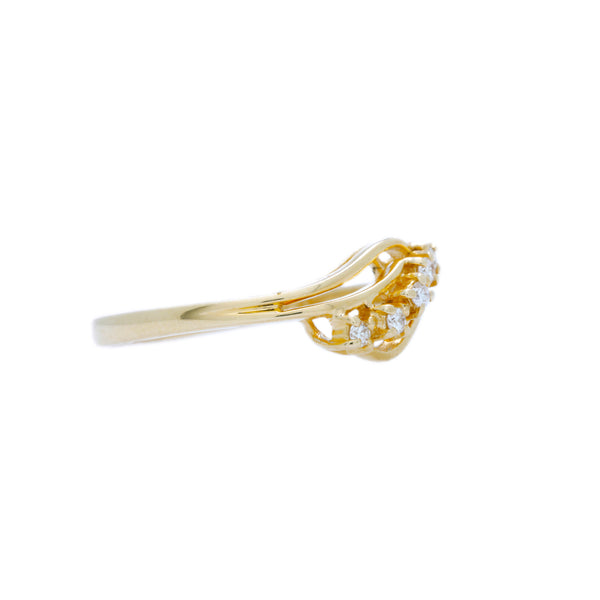A 1970's Whimsical 18 Karat Yellow Gold and Diamond Wave Ring