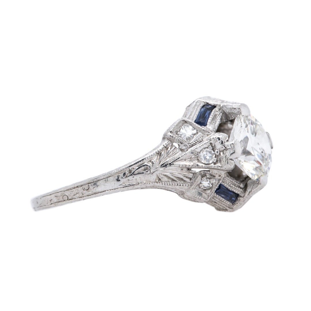 A Dazzling Art Deco Era Platinum, Diamond and Sapphire Engagement Ring