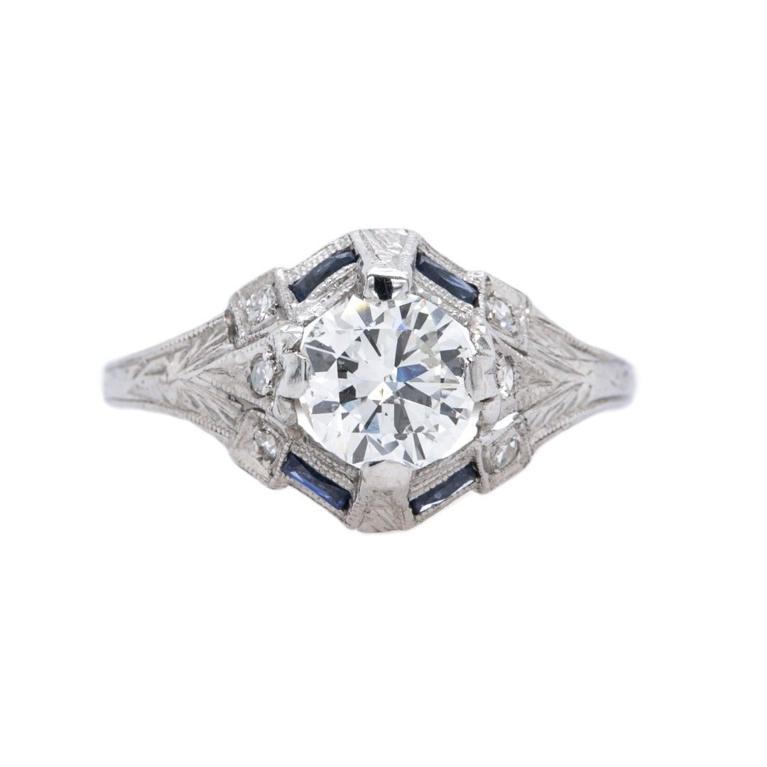 A Dazzling Art Deco Era Platinum, Diamond and Sapphire Engagement Ring