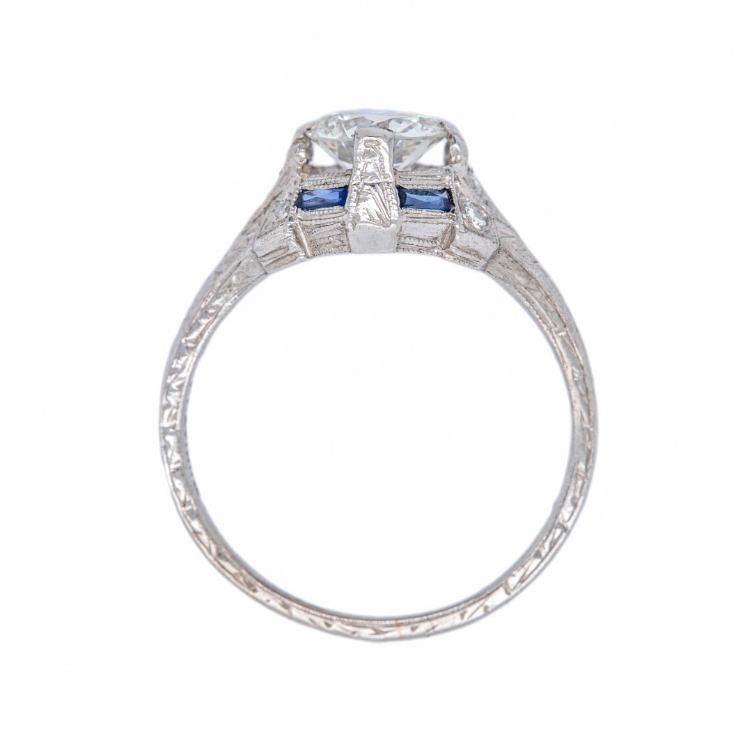 A Dazzling Art Deco Era Platinum, Diamond and Sapphire Engagement Ring