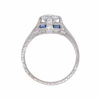 A Dazzling Art Deco Era Platinum, Diamond and Sapphire Engagement Ring